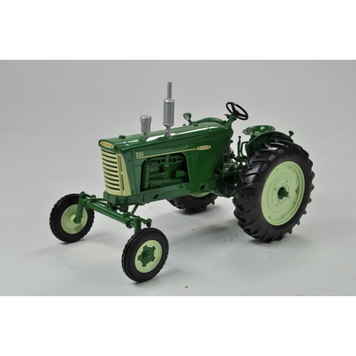 65 - Spec Cast 1/16 Oliver 880 Gas Tractor. Has been on display but appears excellent with original box.