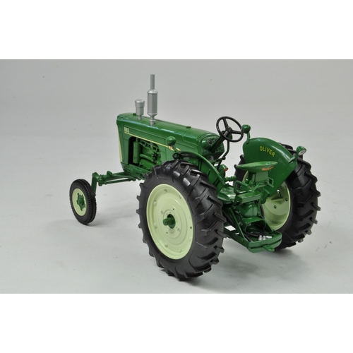 65 - Spec Cast 1/16 Oliver 880 Gas Tractor. Has been on display but appears excellent with original box.