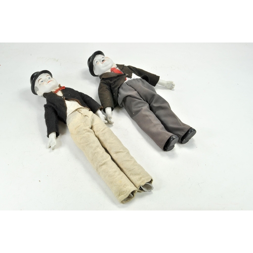 1351 - Ceramic duo of Vintage Laurel and Hardy Dolls with clothes.