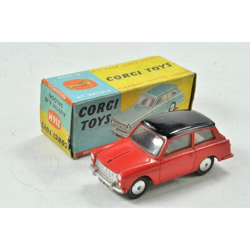 1564 - Corgi No. 216M Austin A40 with flywheel motor (works well). Red body with black roof. Grey base and ... 