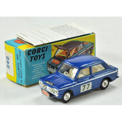 1581 - Corgi No. 340 Hillman Imp in Monte-Carlo trim. Dark blue body with white interior. RN '77' decal on ... 