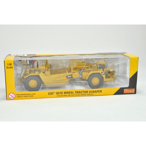 134 - Norscot 1/50 construction issue comprising CAT 657G Scraper. Appears excellent with original box.