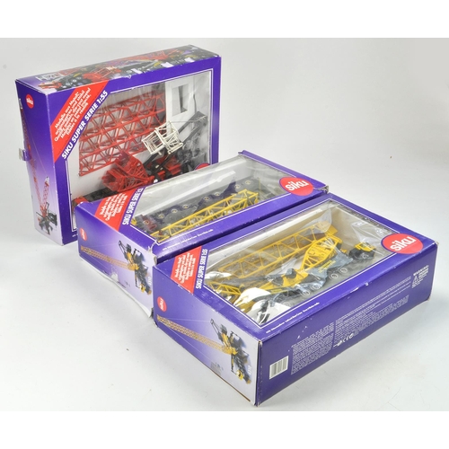 93 - Siku Trio of Diecast Construction issues comprising Mobile Cranes. Appear displayed so may require s... 