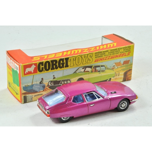 1575 - Corgi Toys 'Whizzwheels'. No. 284 Citro?on SM. Metallic Cerise body with pale blue interior. Spoked ... 