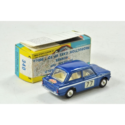 1581 - Corgi No. 340 Hillman Imp in Monte-Carlo trim. Dark blue body with white interior. RN '77' decal on ... 