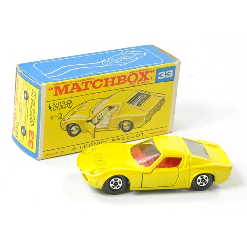 Matchbox Superfast No. 33a Lamborghini Miura. Yellow body, clear windows  with frosted rear engine co