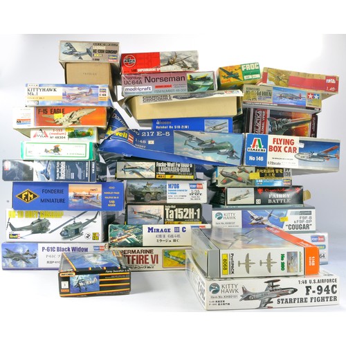 1027 - Plastic Model Kits comprising in excess of 30 Mostly Aircraft and other military vehicles, from vari... 