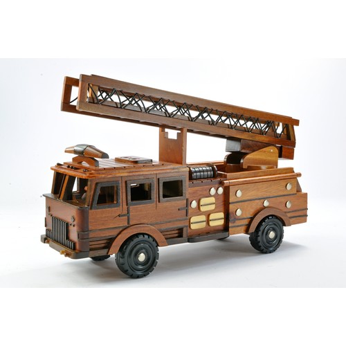 1086 - A large attractive wooden hand built Fire Engine. Made in Vietnam. Some minor marks.