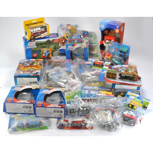 1142 - Large group of Thomas and Friends Toys including Trackmaster, looks to be mostly unused, some packs ... 