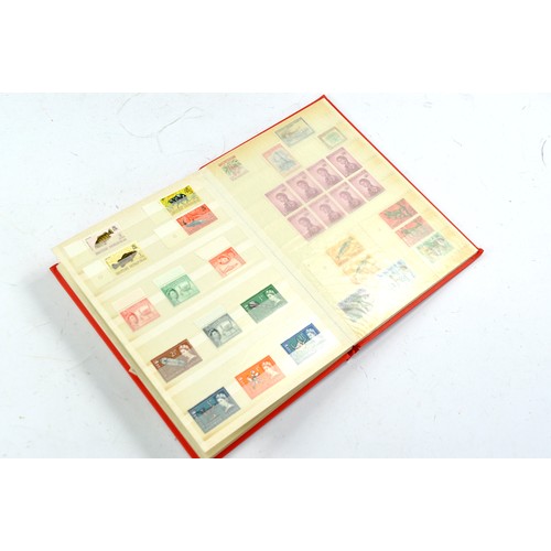 1506 - Stamps comprising a small album of Japanese issues, mid 20th century.