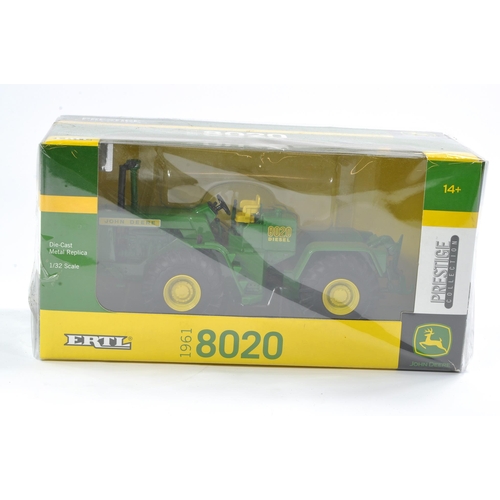 57 - Britains Farm 1/32 issue comprising John Deere 8020 Tractor. Excellent, secure in box and not previo... 