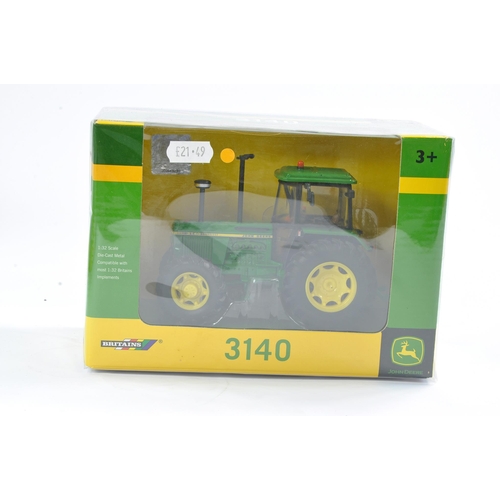 63 - Britains Farm 1/32 issue comprising John Deere 3140 Tractor. Excellent, secure in box and not previo... 