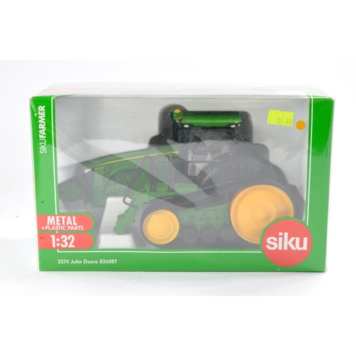 74 - Siku Farm 1/32 issue comprising John Deere 8360RT Tractor. Excellent, secure in box and not previous... 