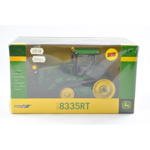 87 - Britains Farm 1/32 issue comprising John Deere 8335RT Tractor. Excellent, secure in box and not prev... 