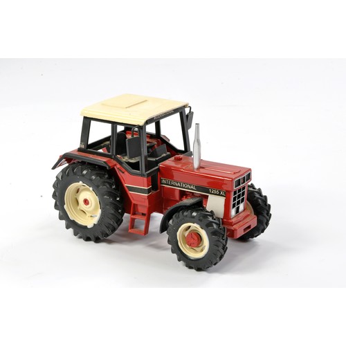 116 - Scratch Built 1/32 farm issue comprising International 1255XL Tractor. An old hard to find example t... 