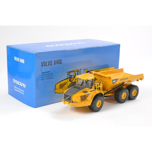 214 - Motorart 1/50 construction issue comprising Volvo A40D Haul Truck. Excellent in box.