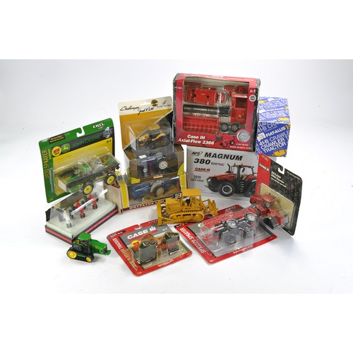 388 - An impressive Farm Model group to include Ertl 1/64 carded issues, mostly unopened plus Ertl 1/32 Ca... 