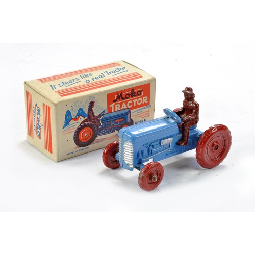 447 - Moko early Issue Ferguson Type Tractor. Original example is Blue with Maroon / Crimson metal wheels ... 