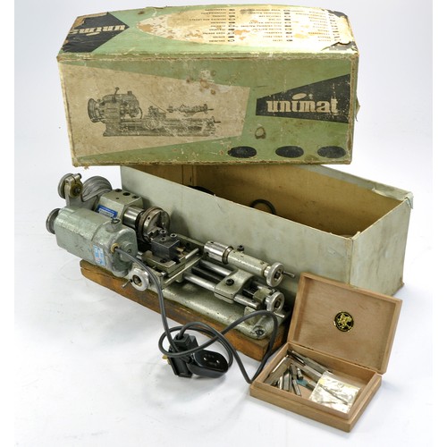 471 - Elliott Unimat mini lathe with original box, fittings and accessories. With age but working.