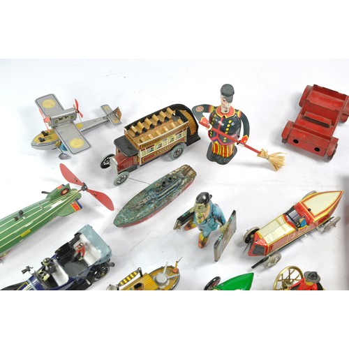 1565 - A group of attractive modern issue tin plate mechanical toys as issued by French Magazine Jouets en ... 