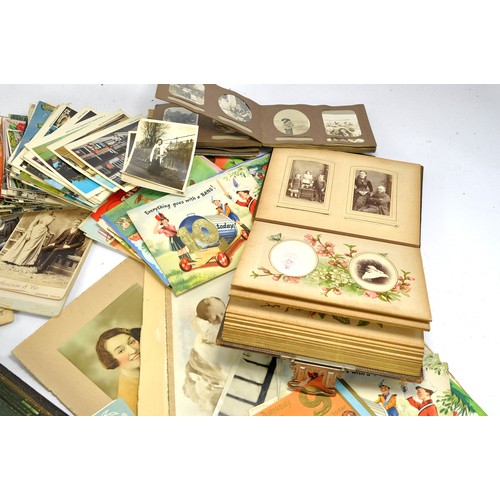 1577 - A very large group of general ephemera comprising a selection of Victorian photo albums with some ph... 