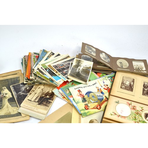 1577 - A very large group of general ephemera comprising a selection of Victorian photo albums with some ph... 