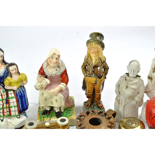 1581 - An intricate group of antique collectables comprising ornate figurines and bygones, including Shelle... 