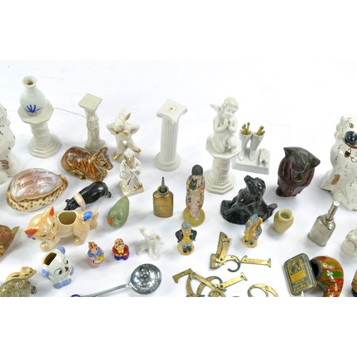 1592 - An eclectic group of vintage and antique miniatures comprising ceramic, metal and wooden themes. Var... 