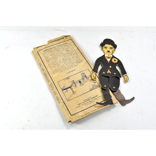 1594 - Scarce Cardboard 'Dancing' Charlie Chaplin Illusion with original packaging (note fair only).