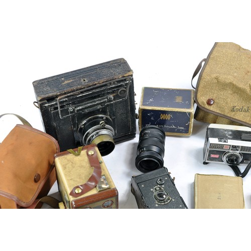 1602 - Further selection of vintage camera and photography equipment some very early, comprising Kodak issu... 