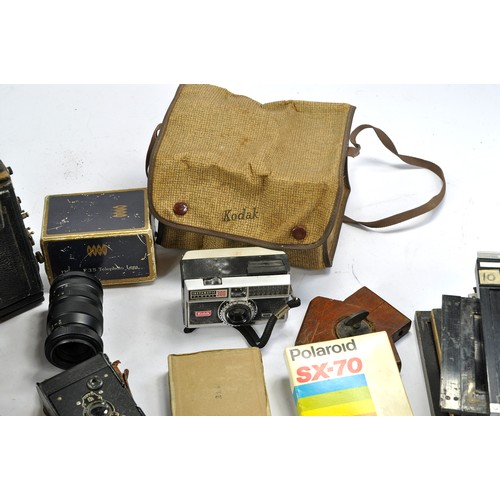 1602 - Further selection of vintage camera and photography equipment some very early, comprising Kodak issu... 