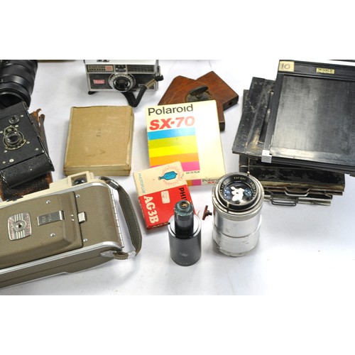 1602 - Further selection of vintage camera and photography equipment some very early, comprising Kodak issu... 