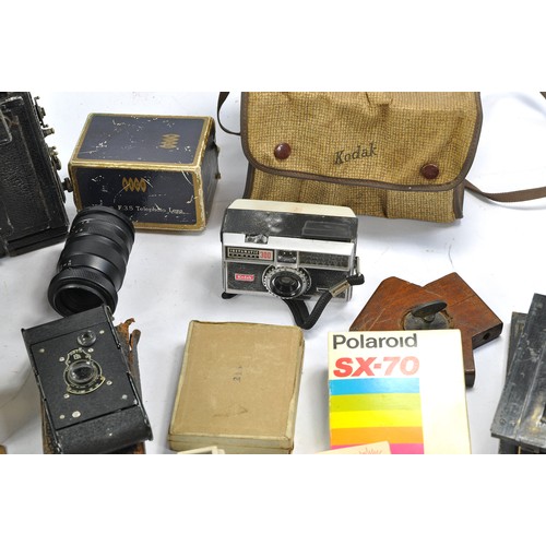 1602 - Further selection of vintage camera and photography equipment some very early, comprising Kodak issu... 