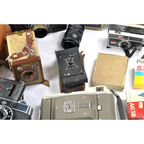 1602 - Further selection of vintage camera and photography equipment some very early, comprising Kodak issu... 