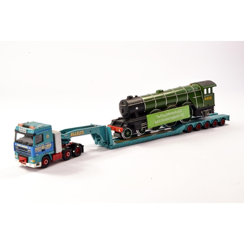 11 - Corgi Diecast Model Truck issue comprising No. CC13213 DAF Low Loader with Flying Scotsman Load in t... 