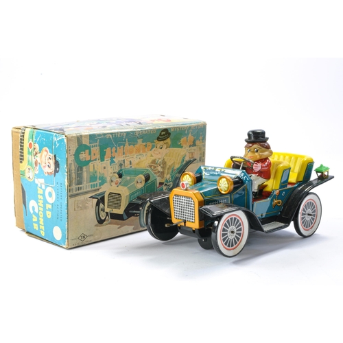 599 - TN Toys Japanese Battery Operated Tinplate issue comprising Old Fashioned Car. In good working order... 