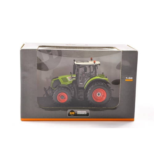 71 - Universal Hobbies 1/32 Farm Model issue comprising Claas 540 Arion Tractor. Excellent and secured in... 