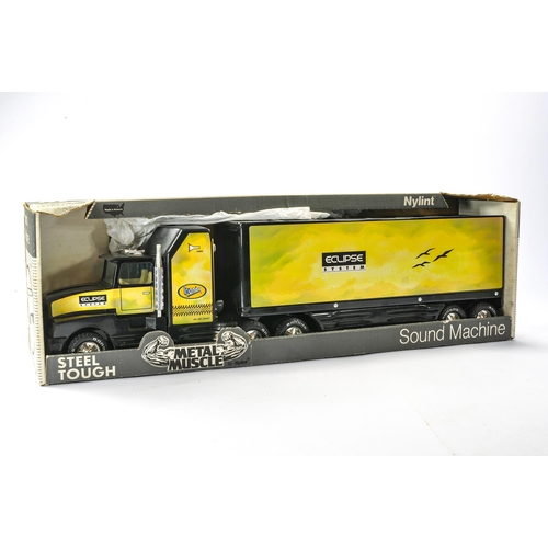 297 - Nylint Large Scale and Electronic Metal Truck and Trailer Set. Appears Excellent in Box.