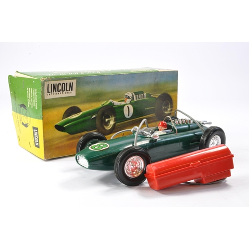 569 - Lincoln Battery Operated Remote Control Lotus Indianapolis Racing Car, with driver figure. Generally... 