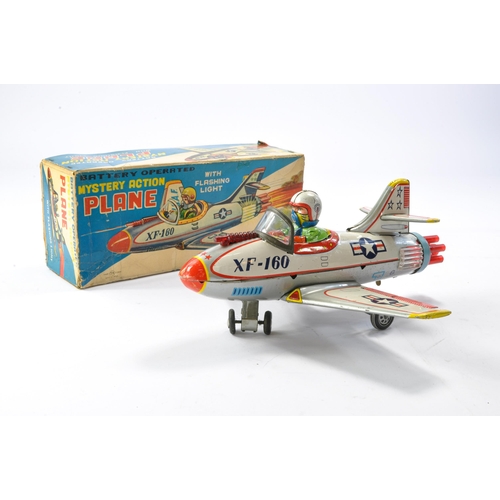 573 - TN Toys Japanese Battery Operated Tinplate issue comprising Mystery Action Plane, XF-160 USAF. In go... 