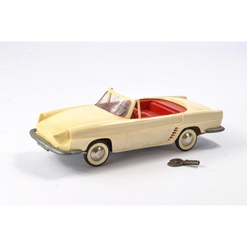 595 - TLJ (France) Plastic Mechanical Renault Floride convertible in cream and red. In working order, issu... 