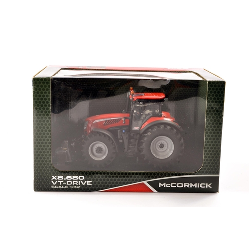 77 - Universal Hobbies 1/32 Farm Model issue comprising McCormick X8-680. Excellent and secured in Box.