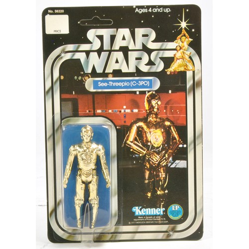 Kenner Star Wars Original Carded Figure comprising See-Threepio (C-3PO) . Factory sealed with no evident faults to bubble. Figure is on 12 back card. Card is unpunched and generally excellent with little sign of wear. With acrylic presentation case. Very hard to find in this condition, likely very high grade.