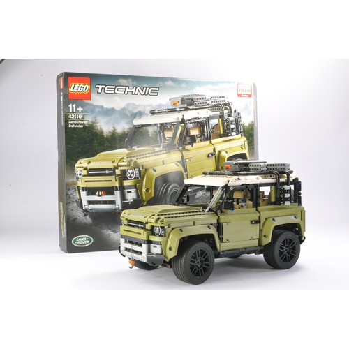 129 - Lego Technic comprising set no. 42110 Land Rover Defender.  Set is built but complete with original ... 