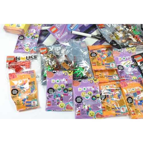 173 - A large collection of ex shop Lego, comprising various bagged kits including Dots plus others. Ideal... 