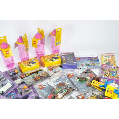 173 - A large collection of ex shop Lego, comprising various bagged kits including Dots plus others. Ideal... 