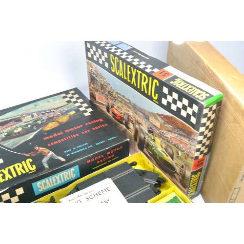 296 - Duo of Scalextric Sets including set no. 31, which appears to be complete and generally good to very... 