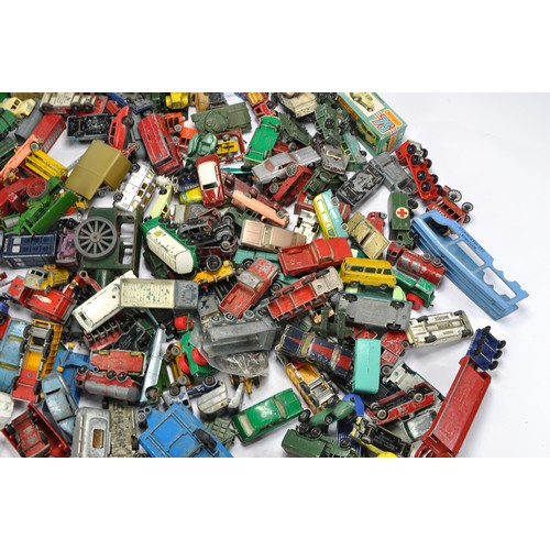 304 - A large group of playworn diecast from various makers including Matchbox, Husky and others.