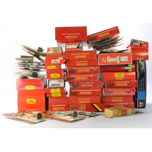 489 - Hornby Model Railway comprising a large collection of trackside accessories and layout items, many l... 