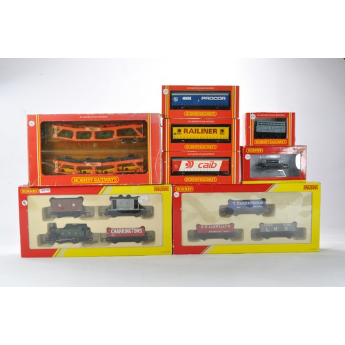 528 - Model Railway issues comprising various Hornby wagons including multi pack sets. Look to be without ... 